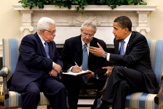 image of President Barack Obama meets with Palestinian Authority President Mahmoud Abbas in the Oval Office Thursday, May 28, 2009.  The man sitting between them is an interpreter. 