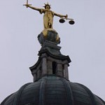 image of gilded statue of Justice on top of Old Bailey
