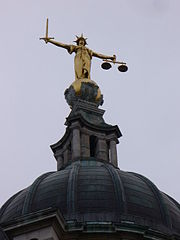 image of gilded statue of Justice on top of Old Bailey