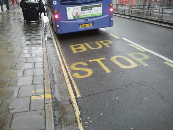 image of bus stop featuring words Bup Stop