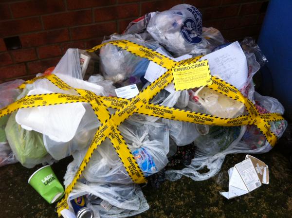fly-tipping covered in Environmental Crime Scene tape