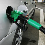 image of petrol pump nozzle in tank