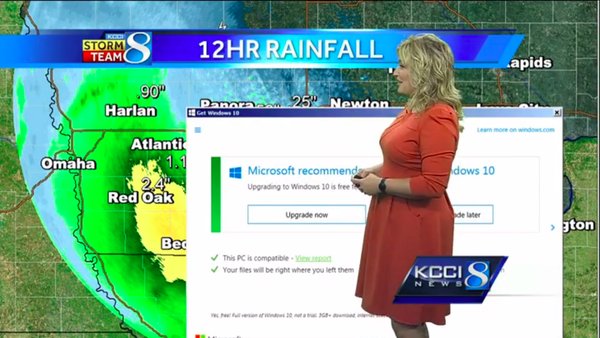 screenshot of Windows 10 update interrupting live TV weather forecast